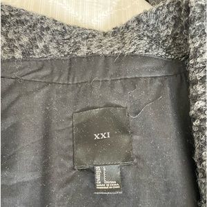 Black and white fall jacket with leather trim